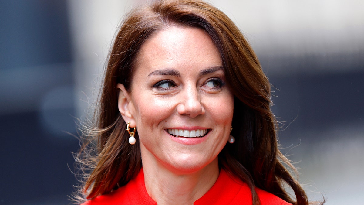 A close-up of Kate Middleton wearig red