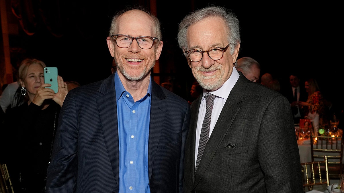 Ron Howard and Steven Spielberg standing next to each other at a public event