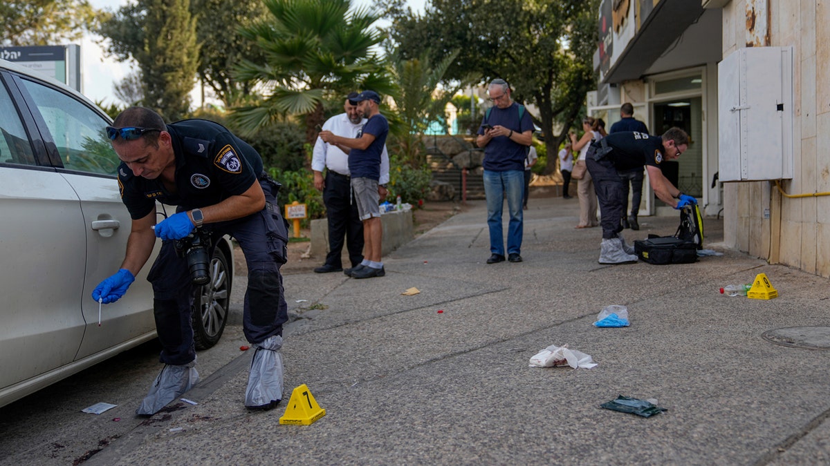 Israeli police inspecting shooting attack