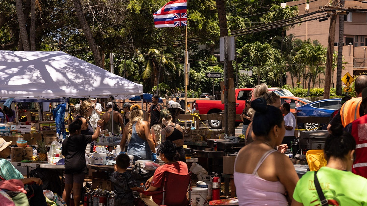 Displaced Hawaiian residents at a distribution center for aid