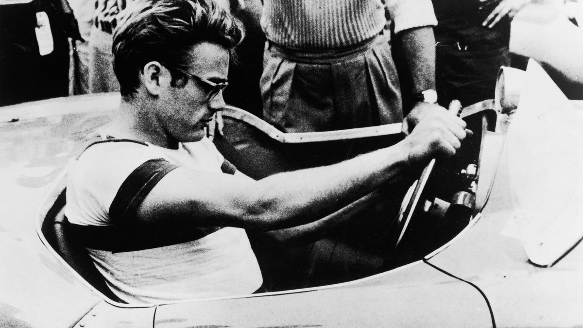 James Dean sitting in a sports car