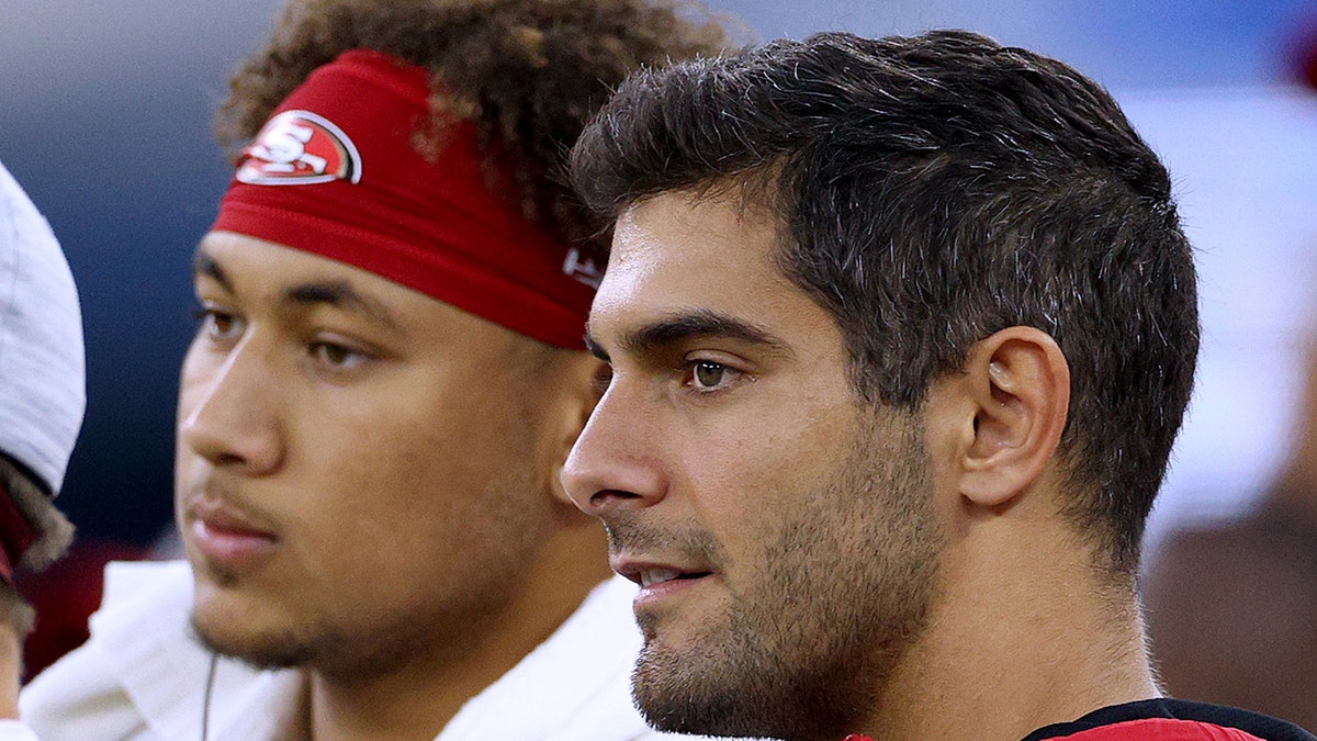 Jimmy Garoppolo and Trey Lance next to each other