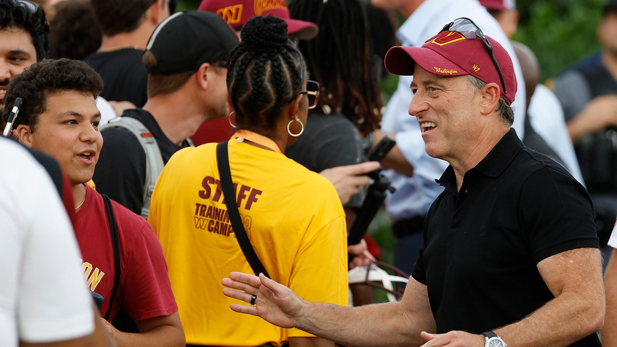 Josh Harris talks to Commanders fans