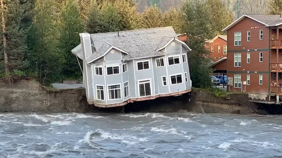 House on banks of Mendenhall River in Alaska