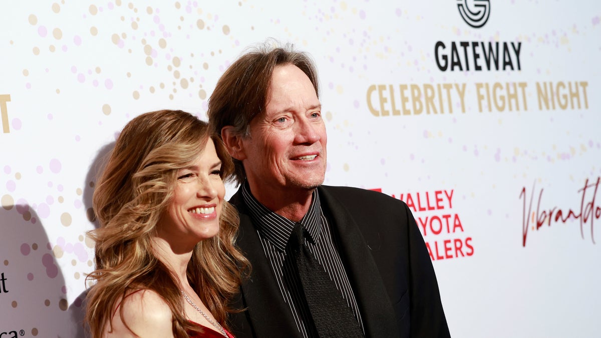 Sam Sorbo and Kevin Sorbo pose together on the red carpet