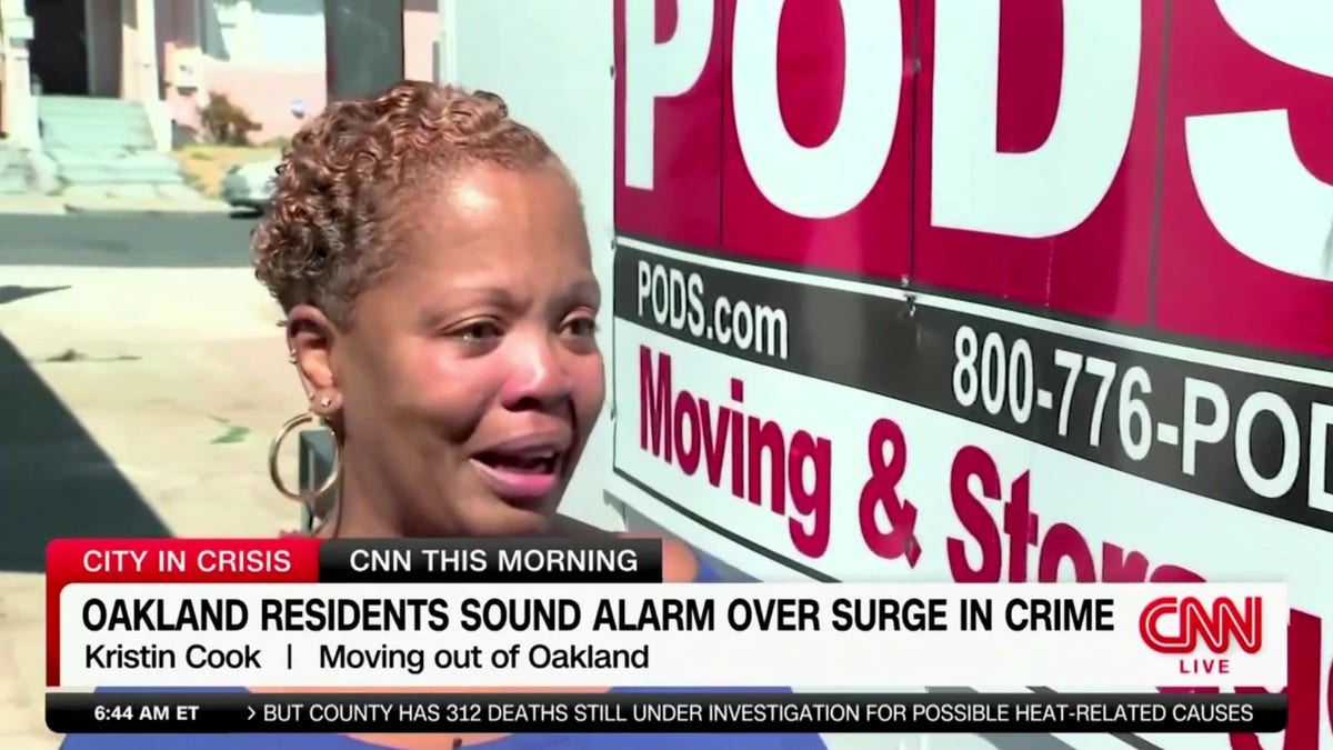 Oakland resident Kristin Cook becomes emotional during an interview with CNN.