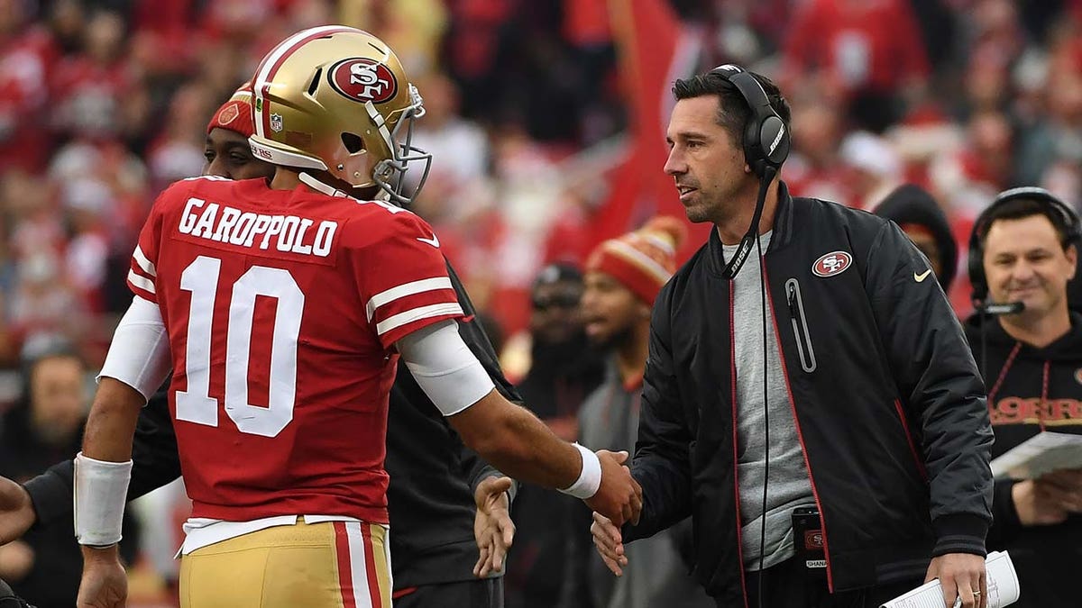 Kyle Shanahan congratulates Jimmy Garoppolo