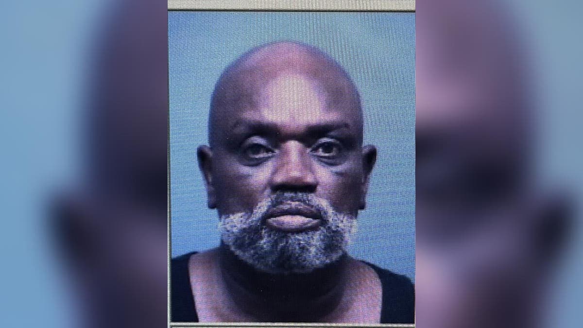 Pictured is a mugshot of Frank Lewis McClure, who spent time in prison for other violent crimes before his death in 2021 and was identified as Vicki Johnson's killer