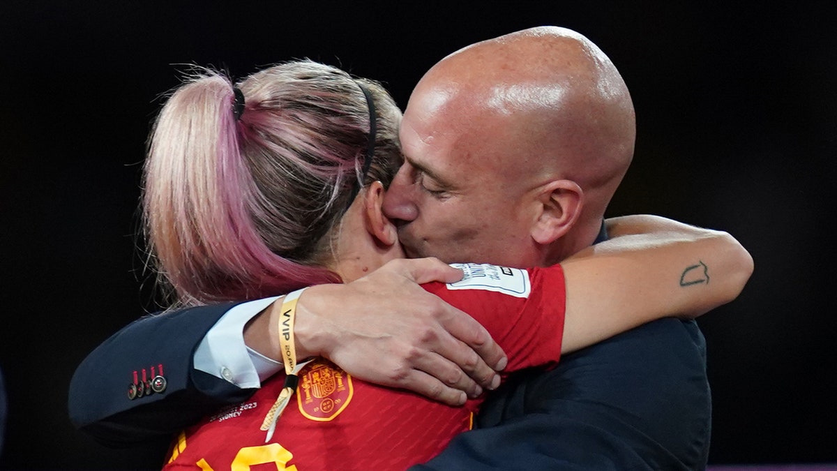 Luis Rubiales kisses Spain player on cheek