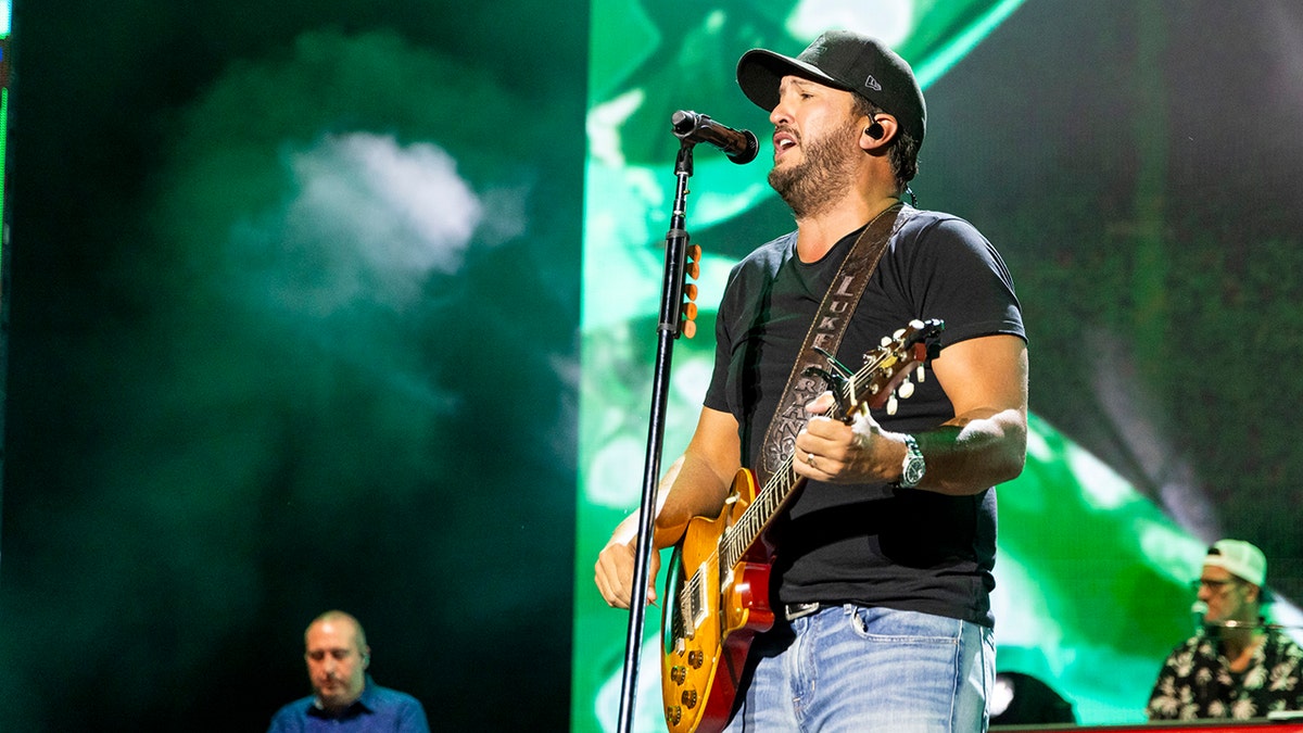 Luke Bryan performing on stage