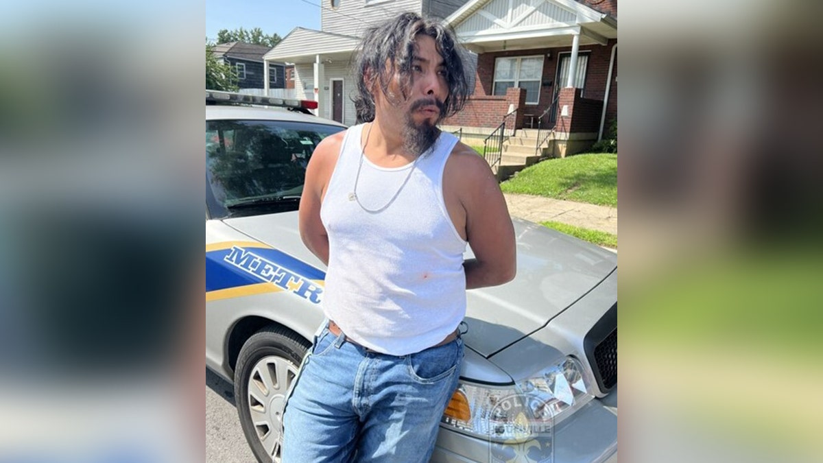Moises May being arrested