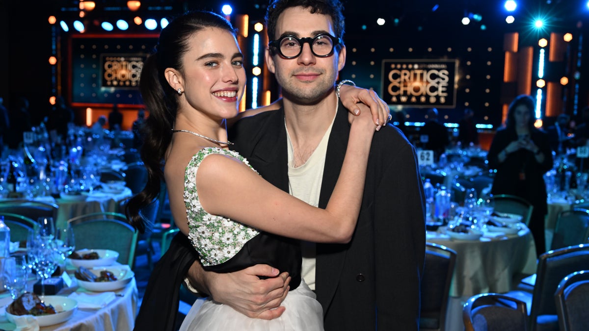 Margaret Qualley and Jack Antonoff hug