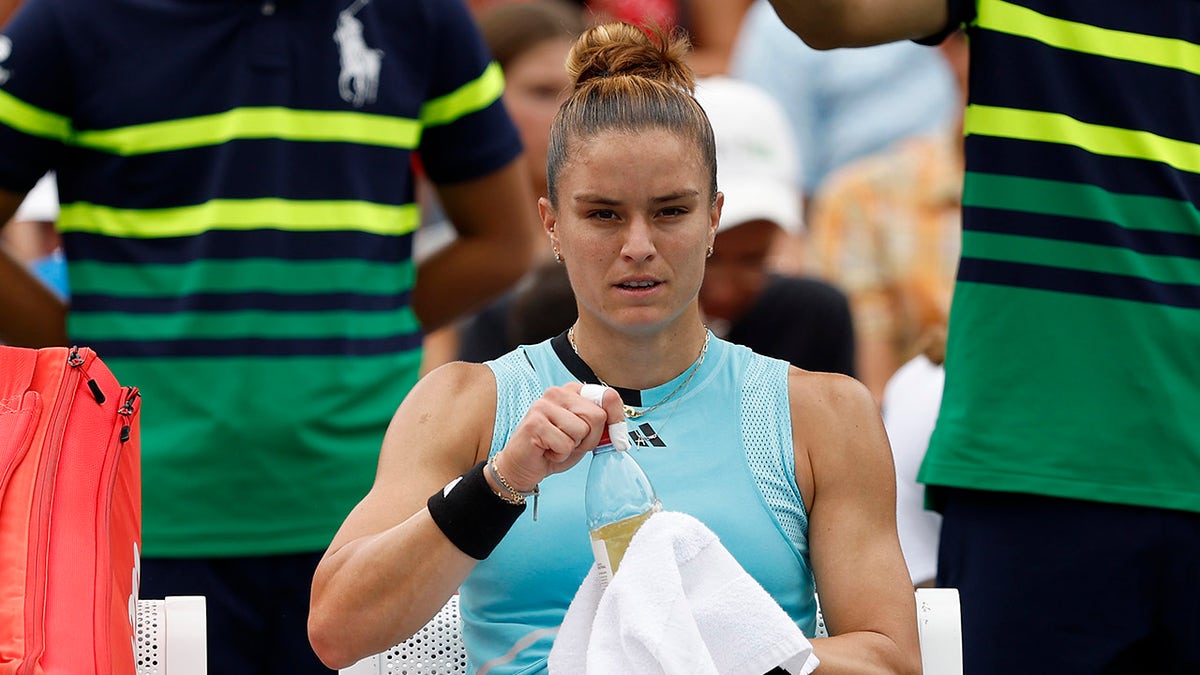 Maria Sakkari sits on bench