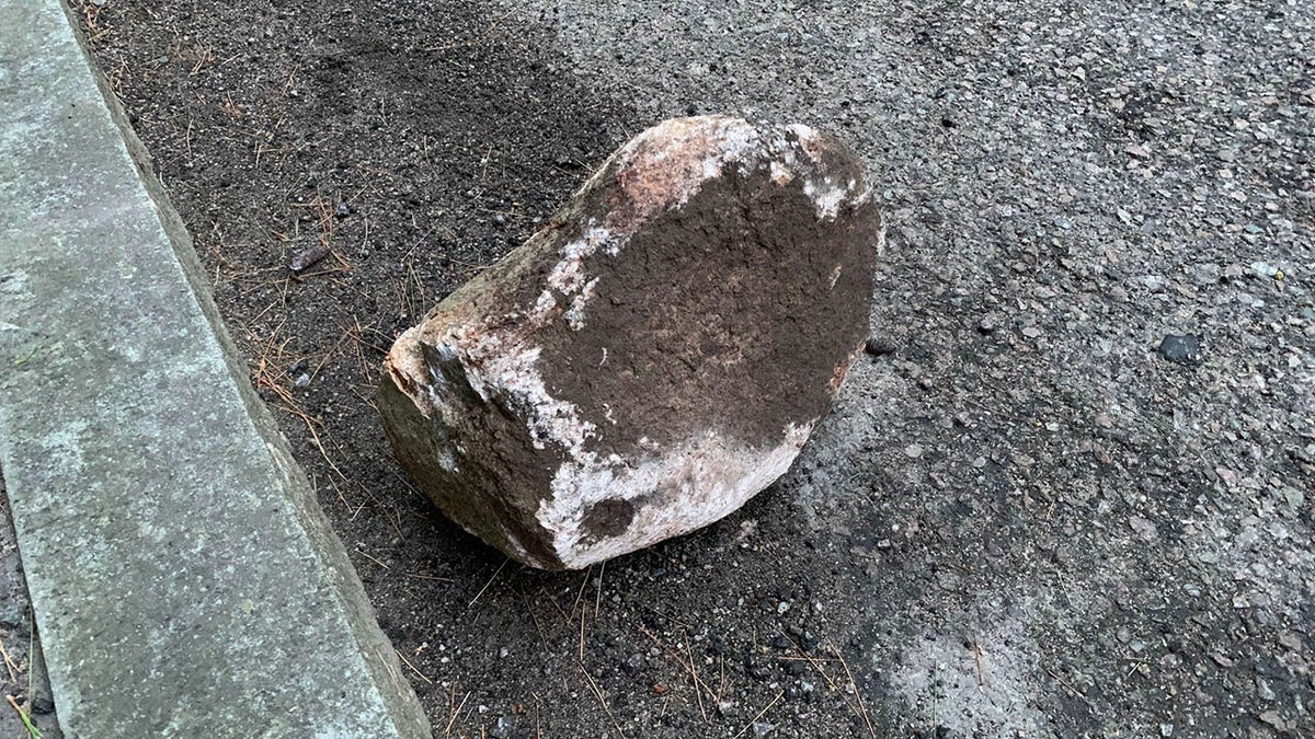 Massachusetts rock allegedly left in road