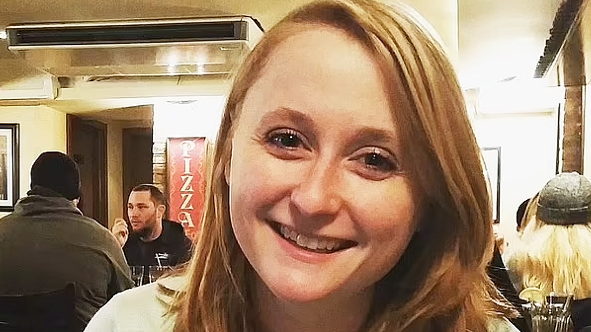 Woman smiling at restaurant