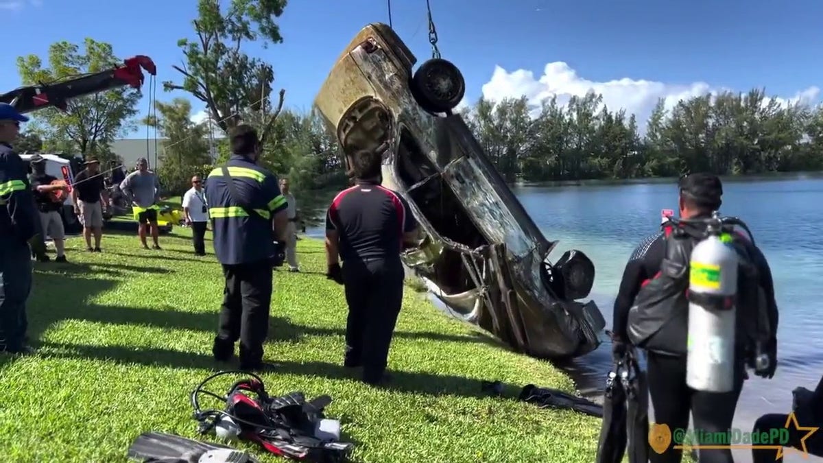 submerged car being pulled out of lake