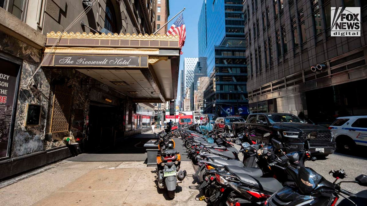 Migrants arrive at the Roosevelt Hotel in Manhattan