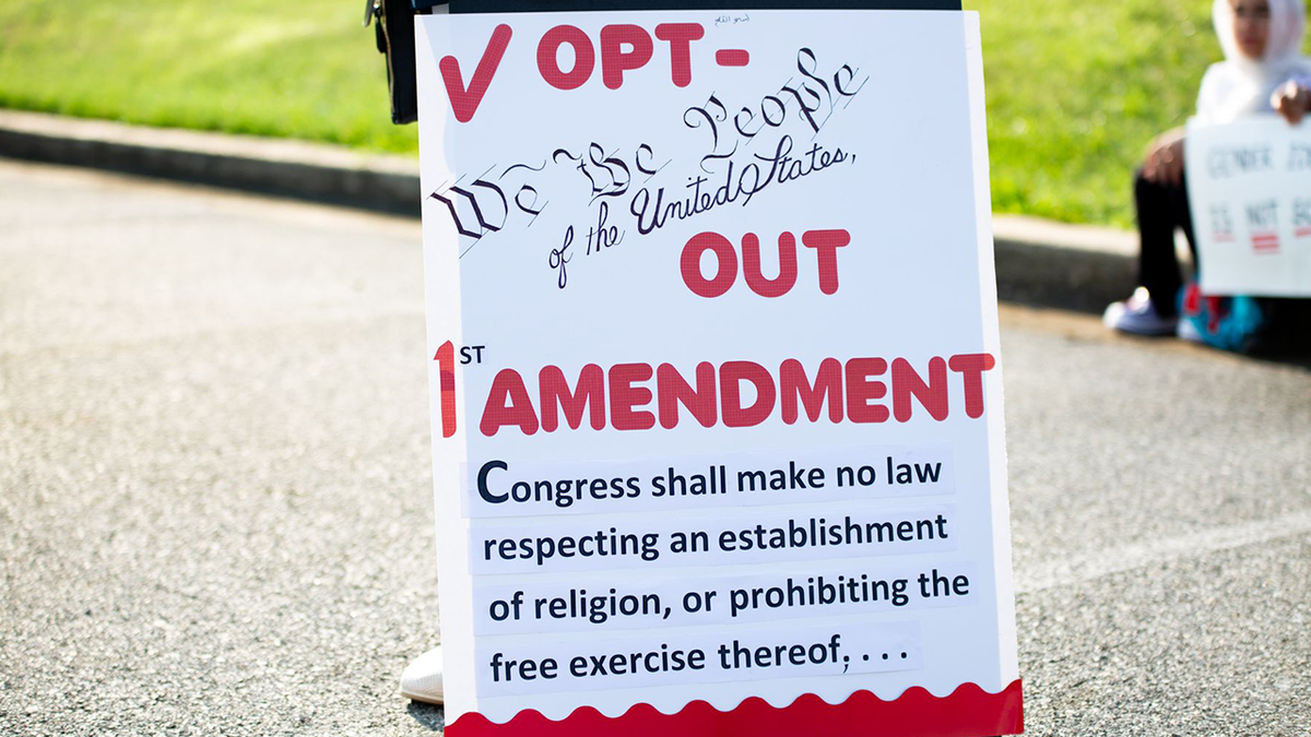 rally sign at New Jersey parental rights demonstration