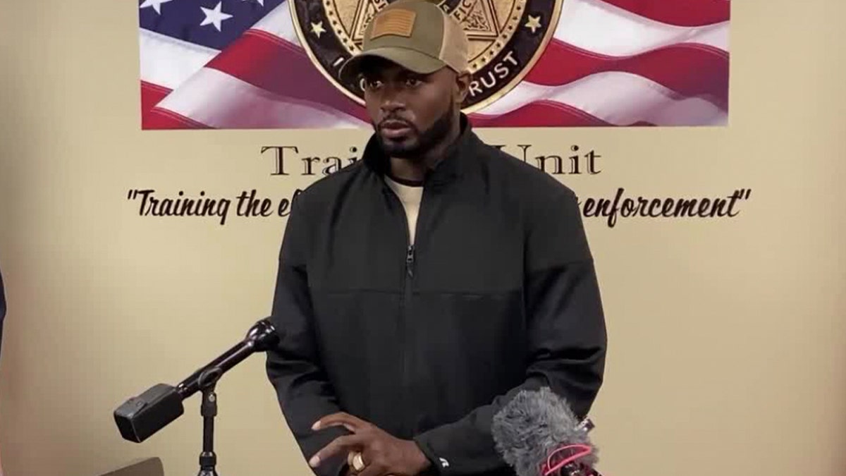 Reginald Robertson is pictured at a press conference surrounding Tiffany Foster's disappearance in 2021