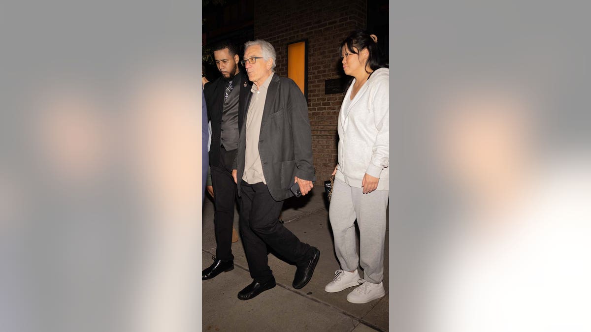 Robert De Niro leaves his birthday party