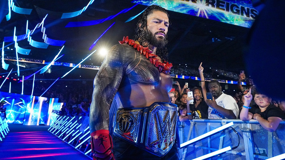 Roman Reigns walks to the ring