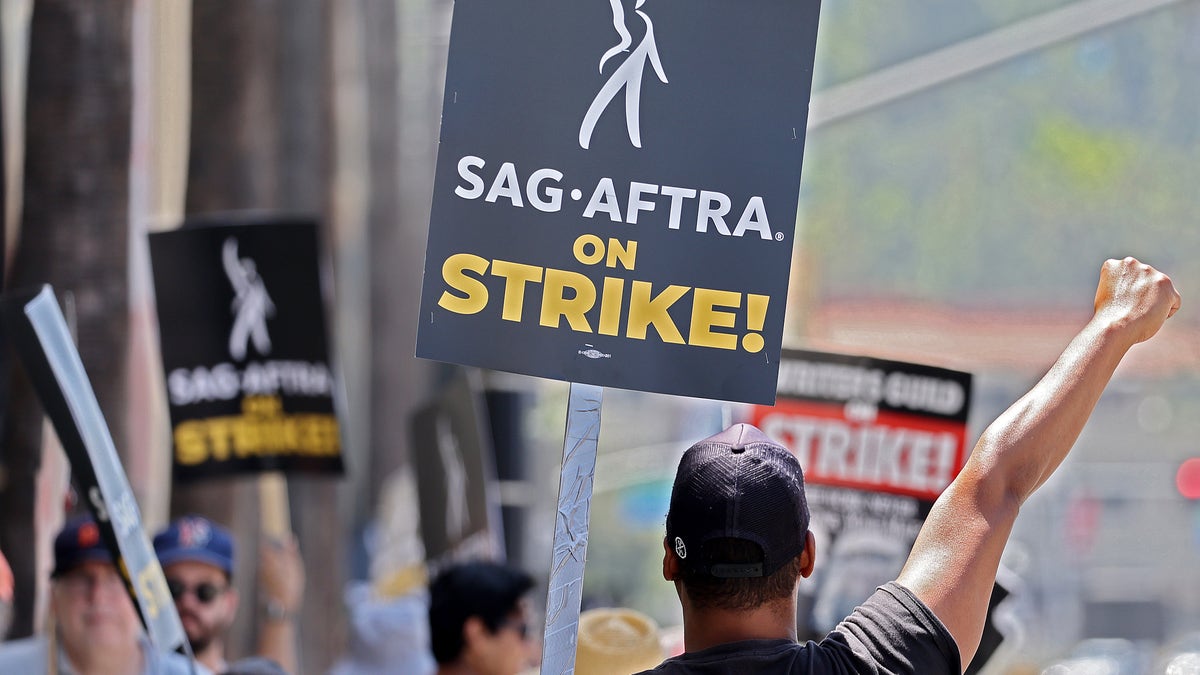 SAG-AFTRA strike sign held by protestor