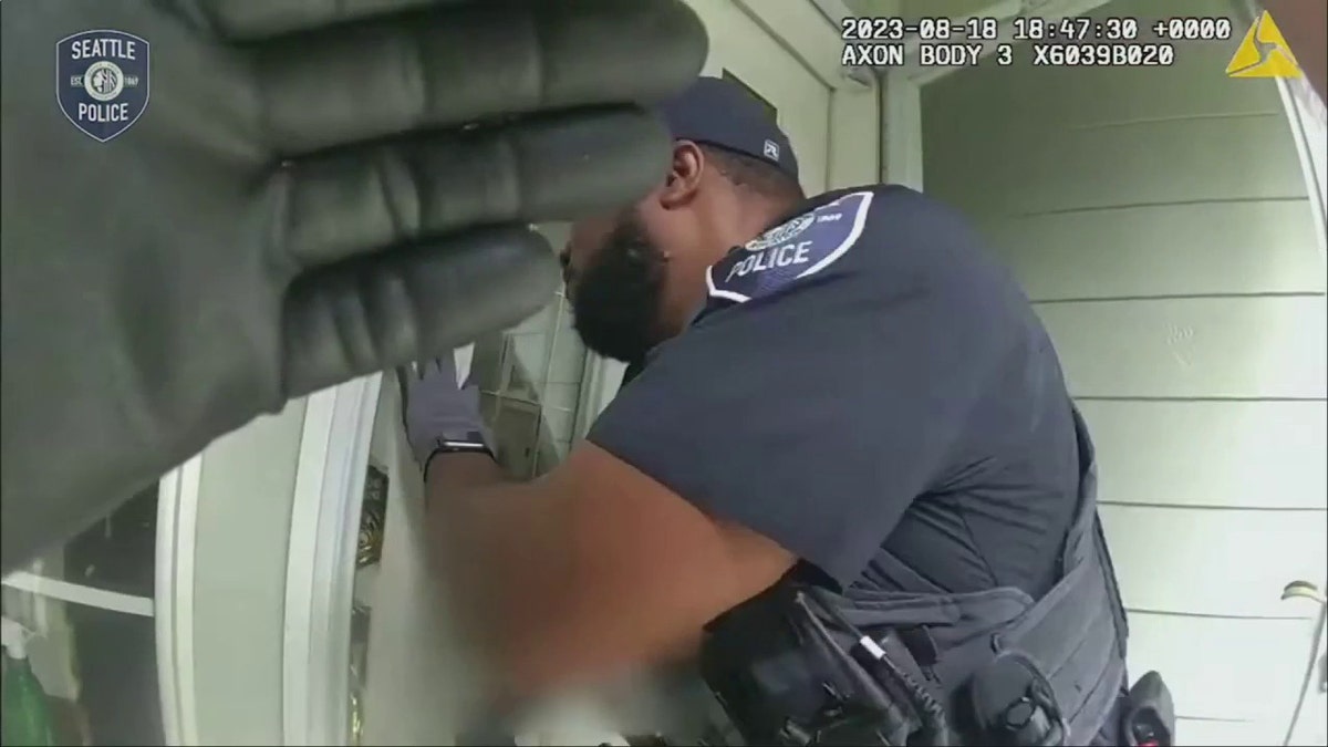 police at front door of home