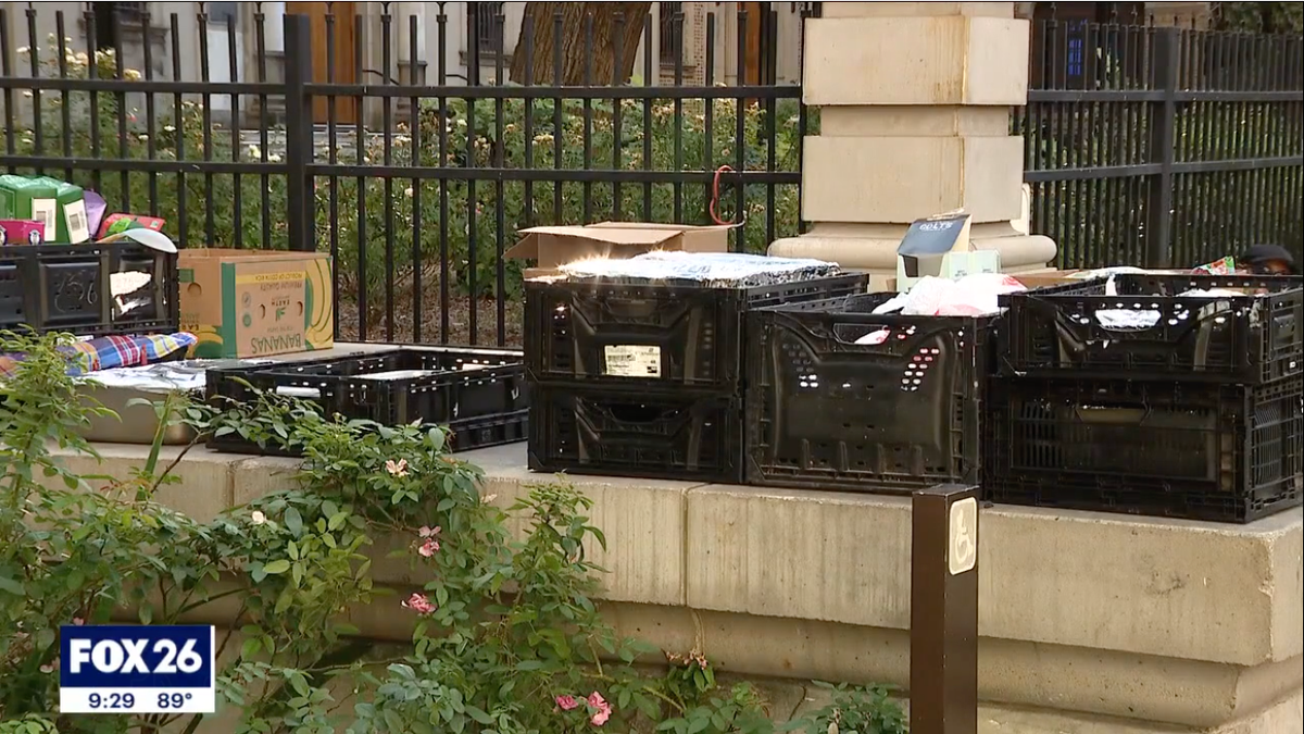 Nonperishable food donations can be seen outside the Houston Public Library