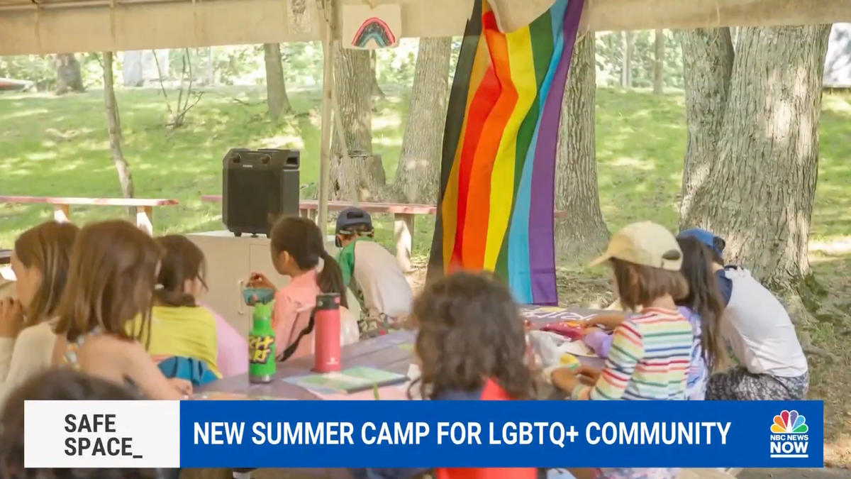 An LGBT flag at a summer camp