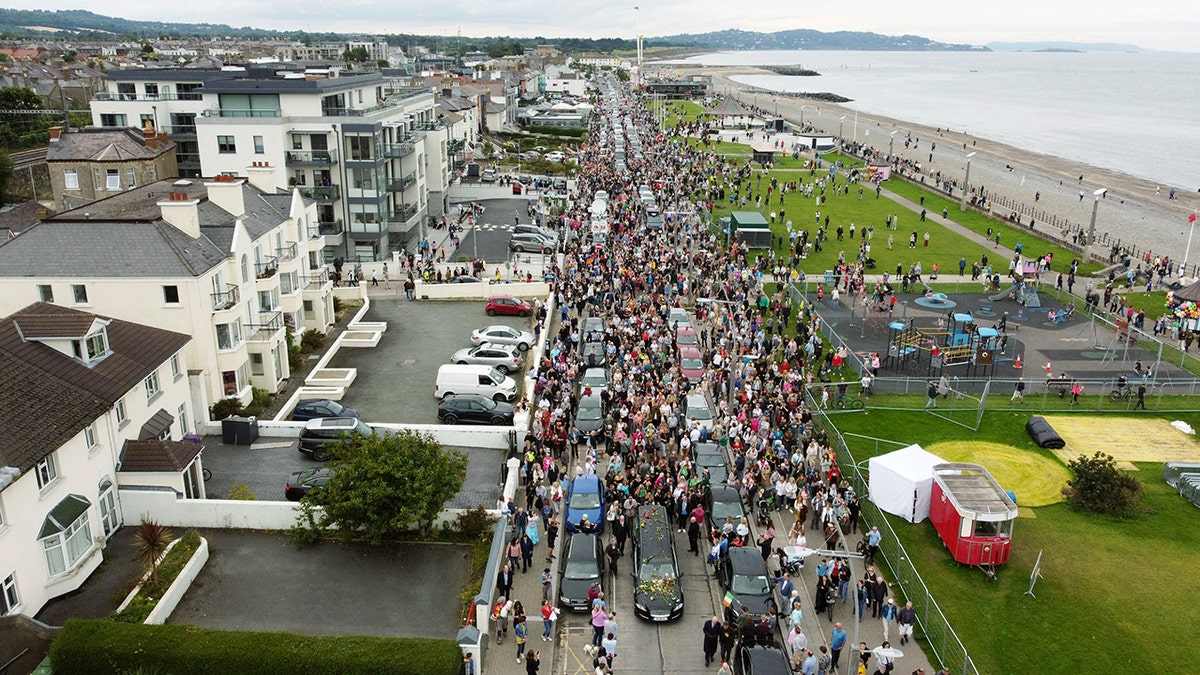 Sinead O'Connor's fans line up for her funeral procession