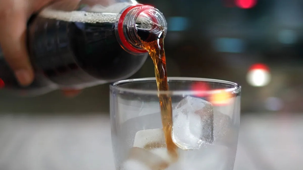 Soda pouring from a bottle