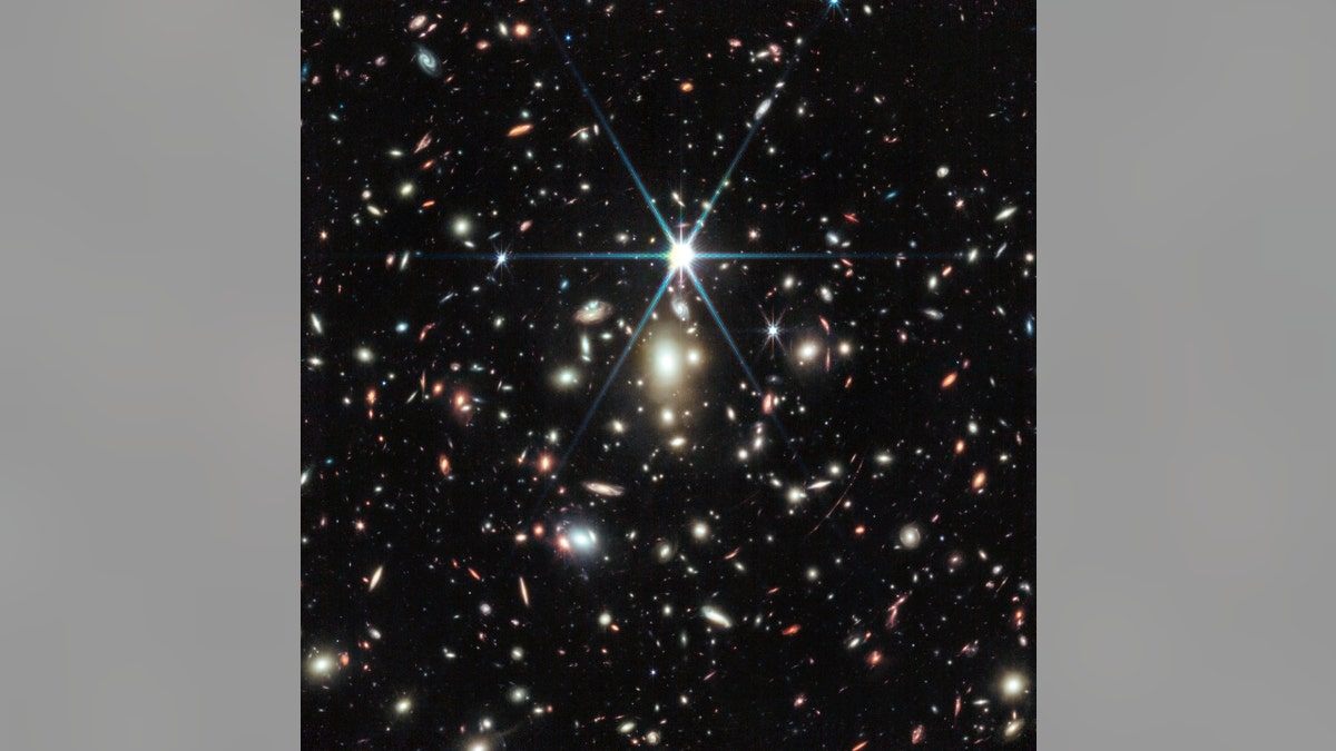 Image from the James Webb Space Telescope of a massive galaxy cluster called WHL0137-08