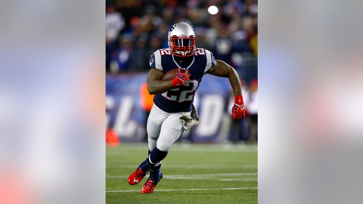 Stevan Ridley playing running back