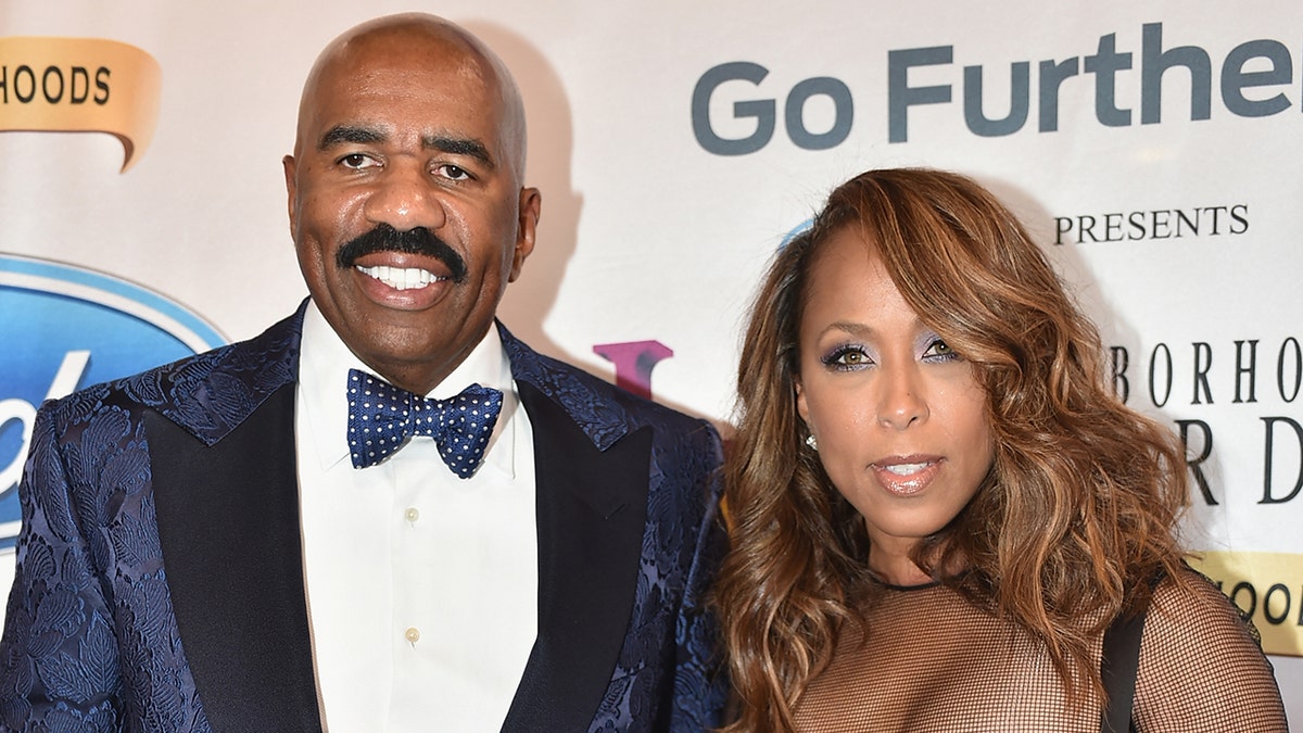 Steve Harvey and his wife at an awards show
