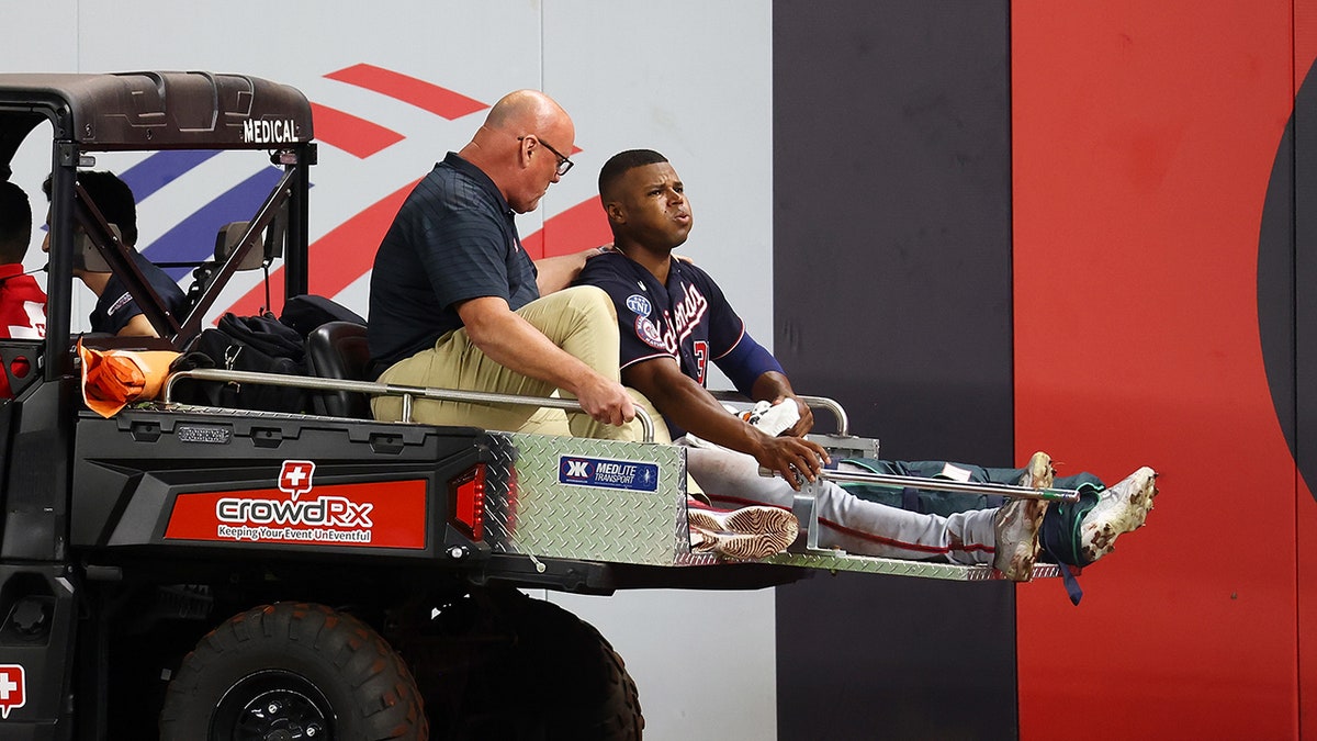 Stone Garrett emotional on cart