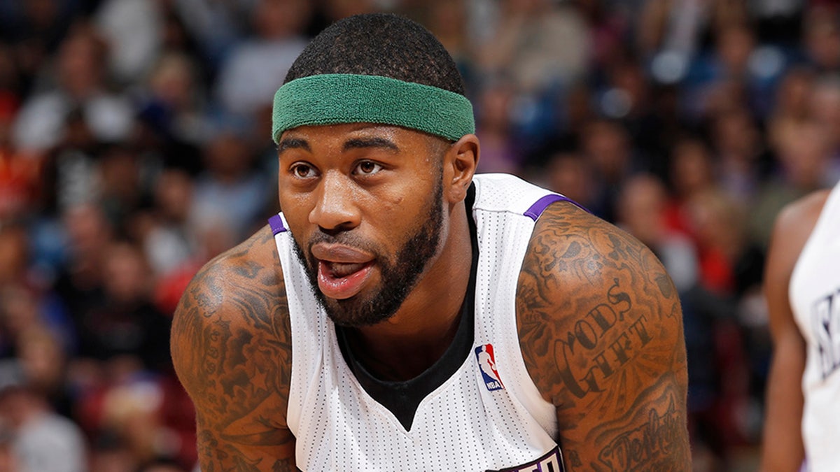 Terrence Williams leans over