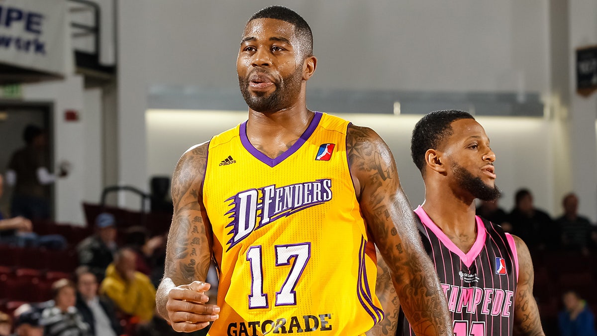 Terrence Williams walks on court