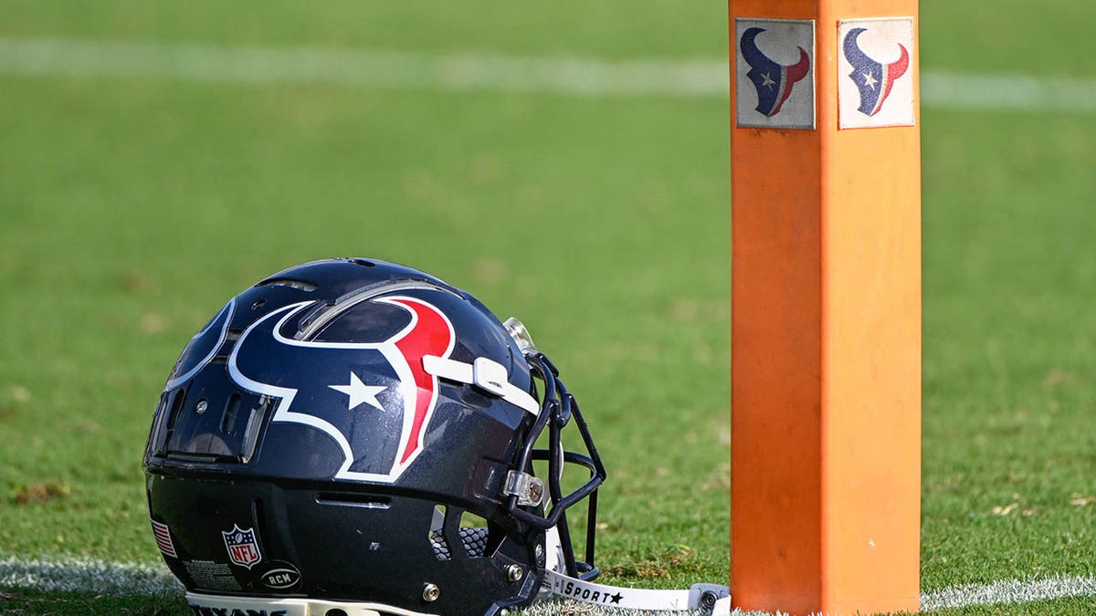 A Texans helmet sits near the pylon on the goal line during day 1 of the Texans Training Camp at Houston Methodist Training Center on July 26, 2023, in Houston, Texas. 