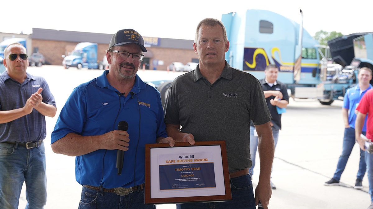 Tim Dean with award