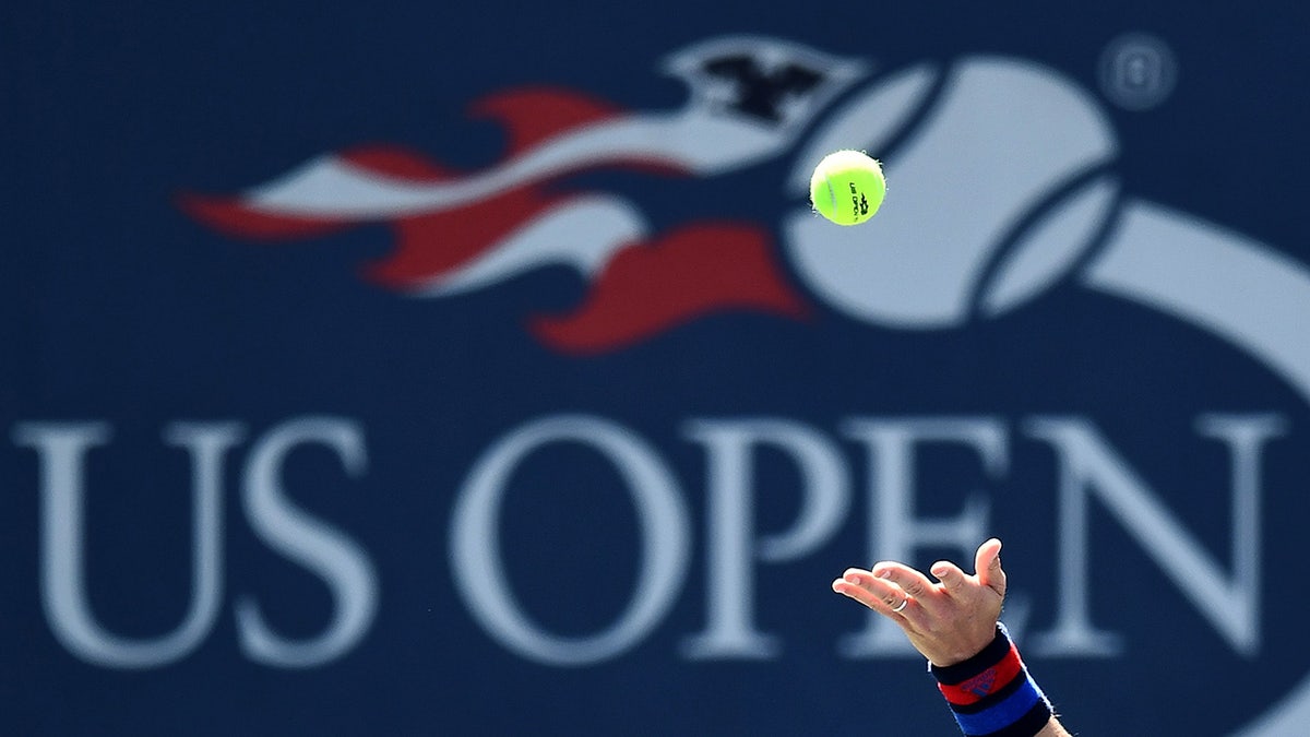 Player serves ball at US Open