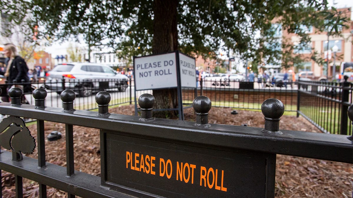 "Do Not Roll" signs at Toomer's Corner