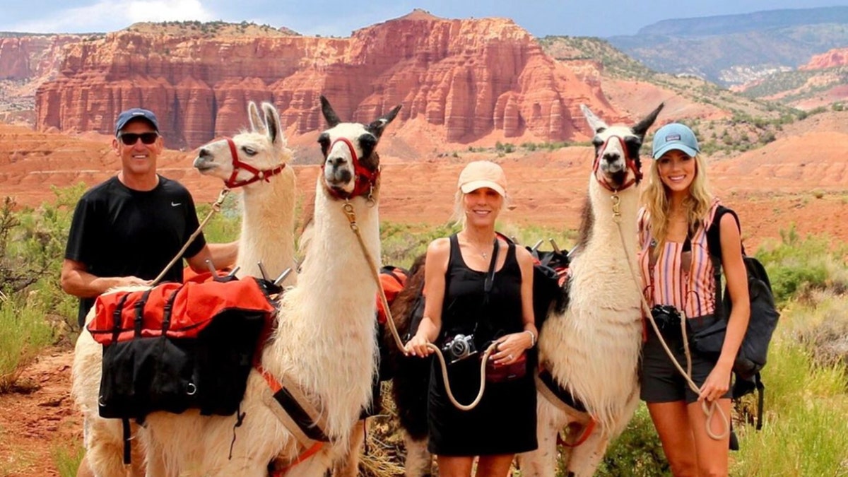 Abby Hornacek with her parents in Utah