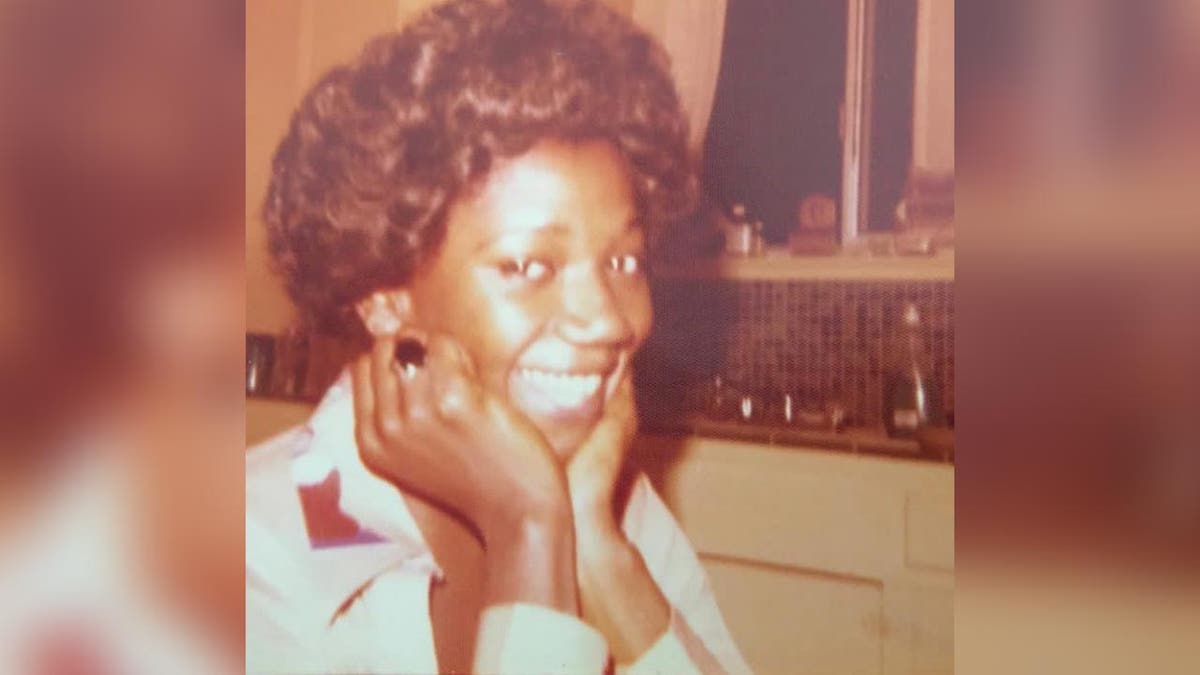 Murder victim Vicki Johnson is pictured smiling into the camera