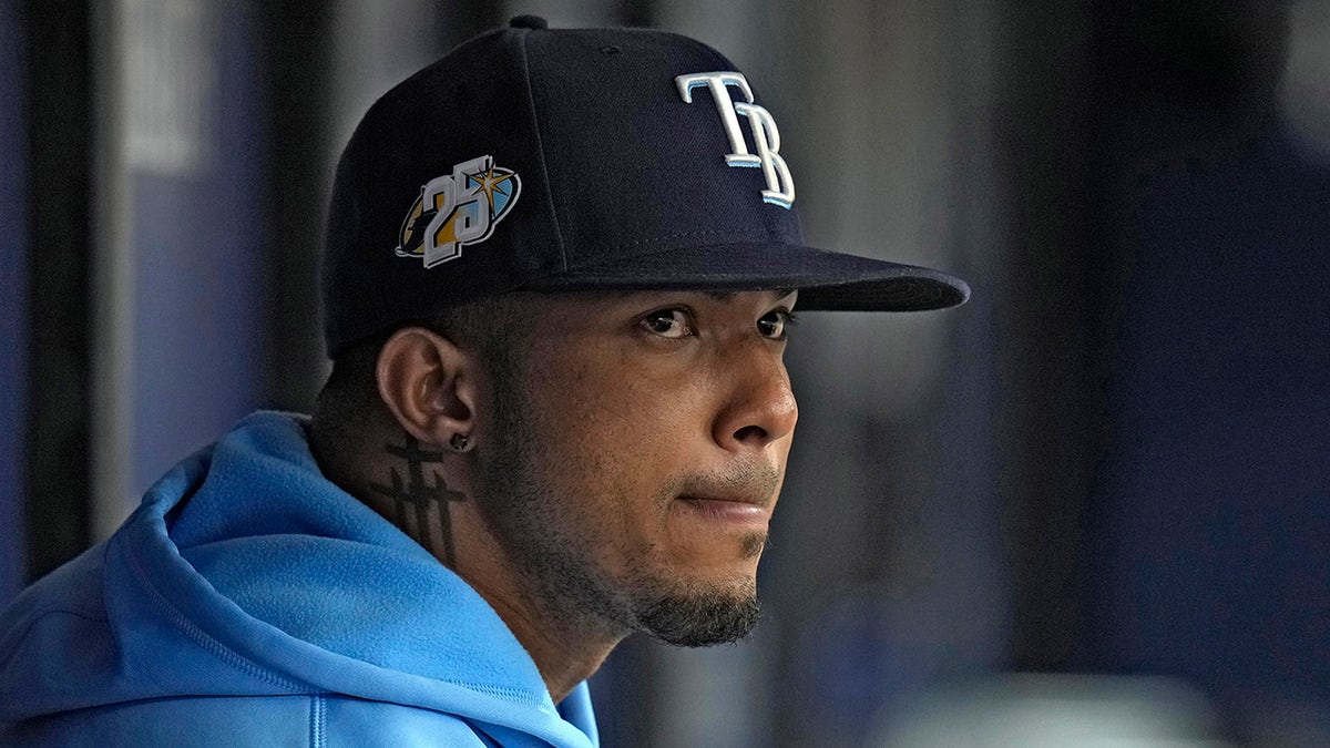 Wander Franco watches from the dugout