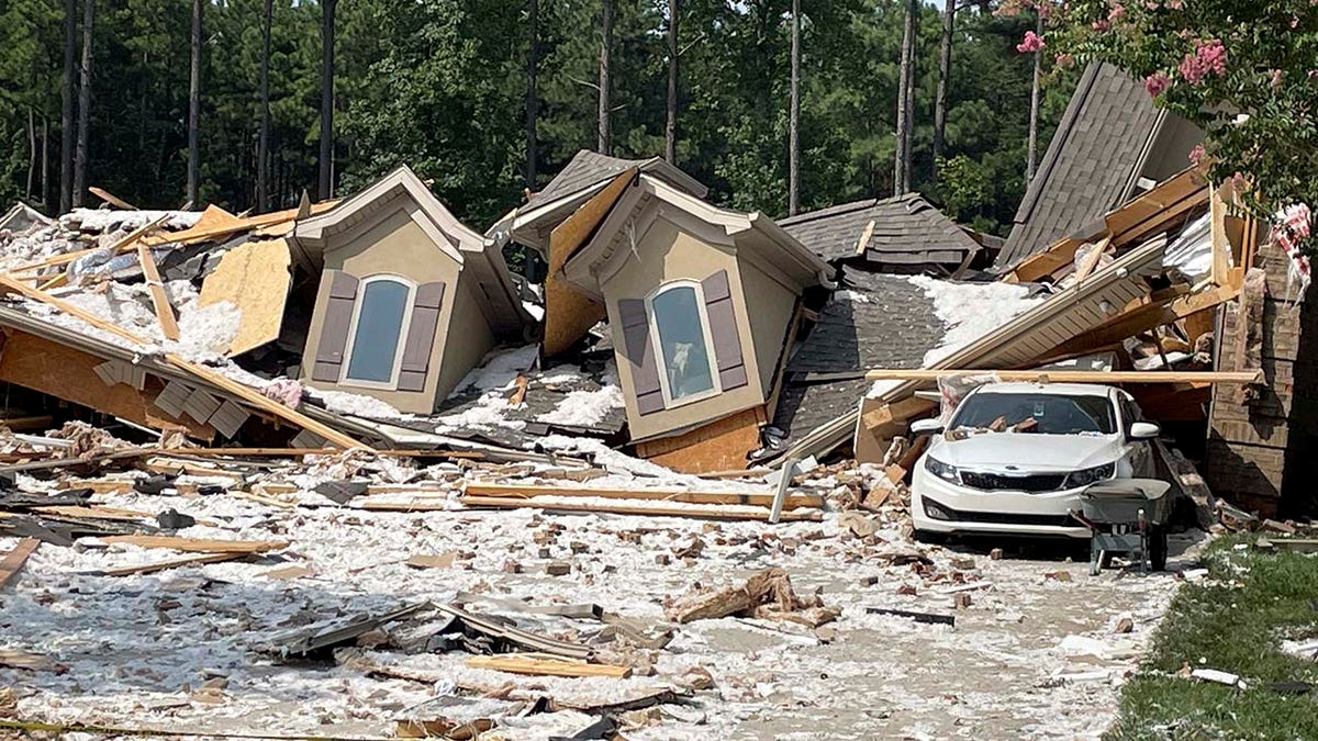 Damage and debris from a home explosion