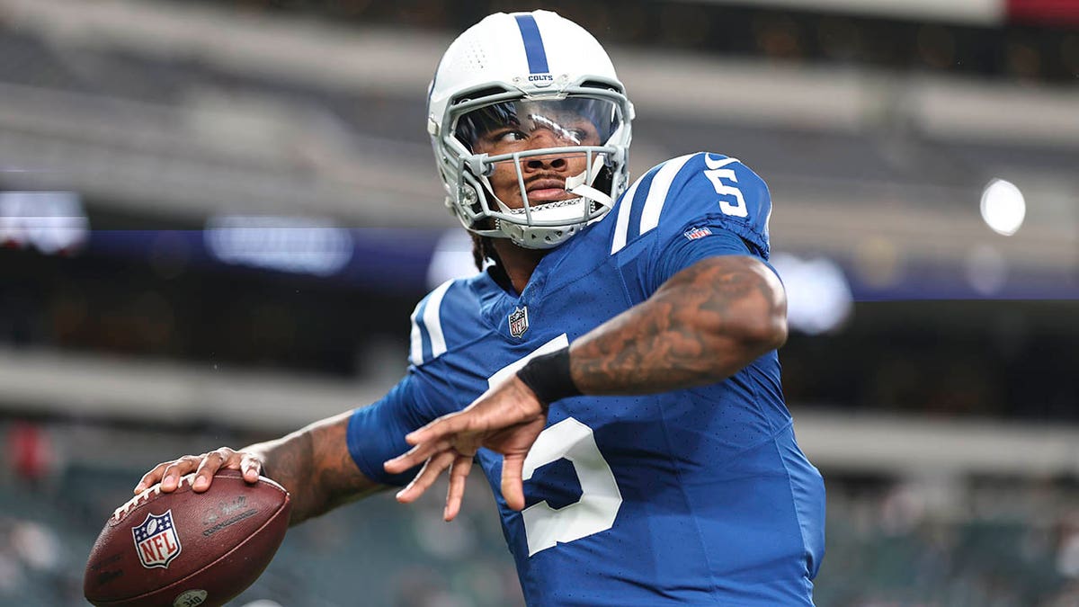 Anthony Richardson warms up before an NFL preseason game