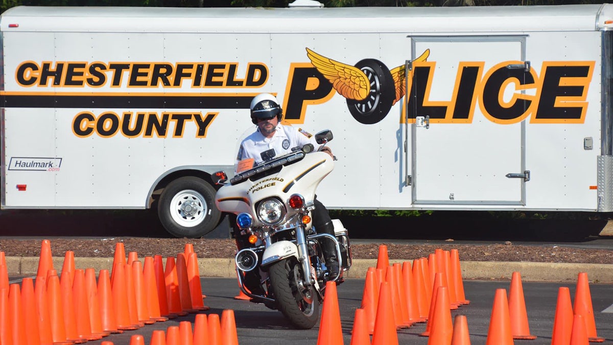 Chesterfield County police officer on a motorcycle navigating traffic cones