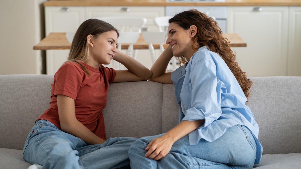 Parent talking to teen daughter