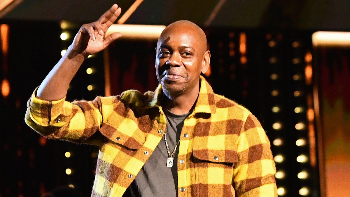 Dave Chappelle on-stage at the Rock and Roll Hall of Fame