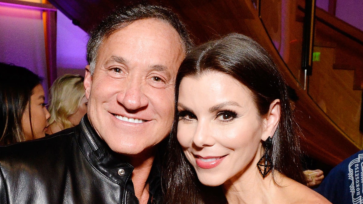 Terry Dubrow and Heather Dubrow smiling